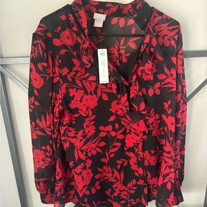 Size 2 Chico’s blouse. Black tank sewn inside. Very cute!